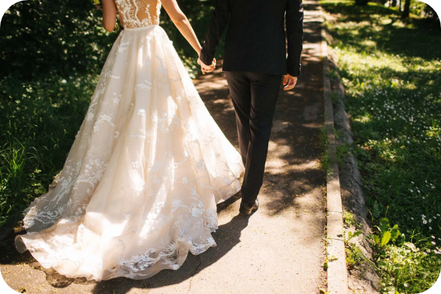 Bride and groom walking away